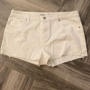 Women's White distressed and flower detail shorts